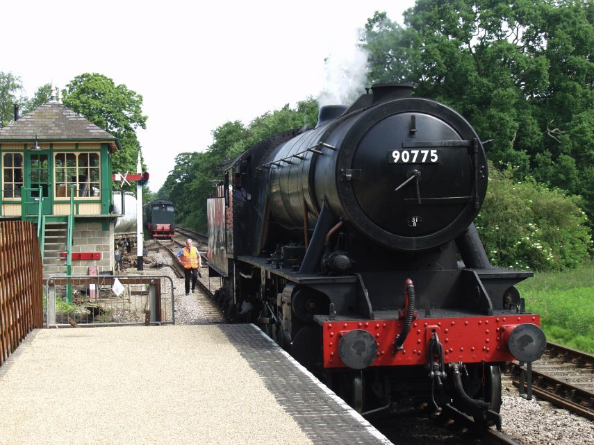 Locomotive approaching its train, Holt Station, Norfolk, England, Great Britain