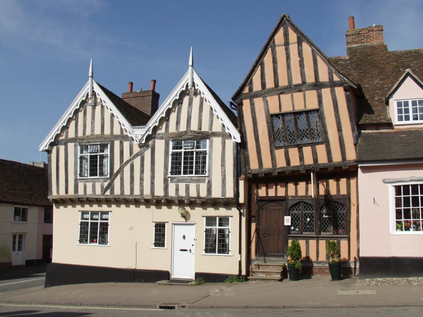 Medieval timber-framed houses, including The Crooked House, High Street, Lavenham, Suffolk, England