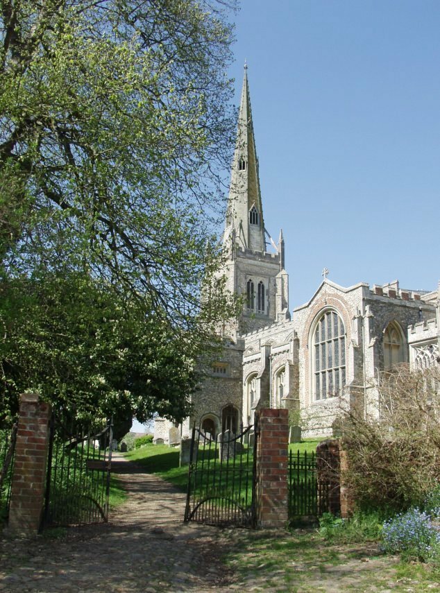 Scene showing the church of St. John the Baptist, Our Lady & St. Lawrence, Thaxted, Essex, England